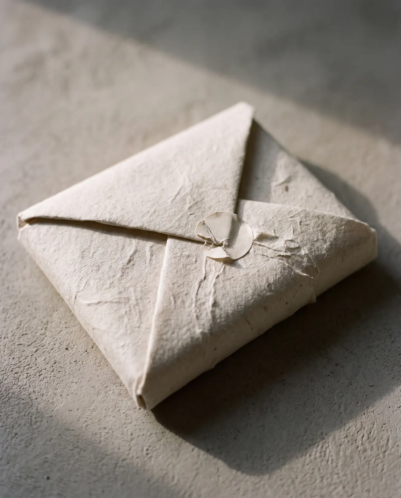 A hand-folded Kōzo envelope